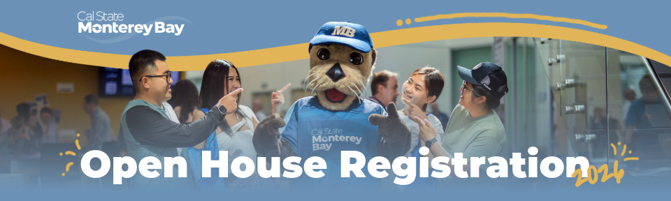 Four people with Monte, the CSUMB mascot